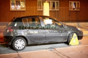 car-clamped-on-street-at-night-in-dublin-republic-ireland