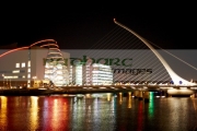 view-the-samuel-beckett-bridge-over-the-river-liffey-the-convention-centre-dublin-at-night-dublin-republic-ireland