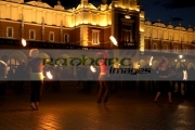 three-female-fire-dancers-street-entertainers-in-front-the-cloth-hall-in-krakow