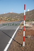 red-white-road-snow-level-marker-on-the-side-the-road-in-Teide-National-Park-Tenerife-Canary-Islands-Spain