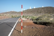 red-white-road-snow-level-marker-on-the-side-the-road-in-Teide-National-Park-Tenerife-Canary-Islands-Spain