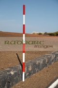 red-white-road-snow-level-marker-on-the-side-the-road-in-Teide-National-Park-Tenerife-Canary-Islands-Spain
