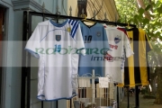 row-uruguay-football-shirts-on-sale-outside-souvernir-shop-Colonia-Del-Sacramento-Uruguay-South-America