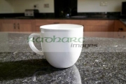 coffee-cup-mug-on-granite-worktop-in-kitchen-in-the-uk