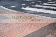 textured-pedestrian-crossing-pavement-in-the-wet-in-the-uk