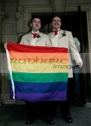 Christopher-Flanaghan-Henry-Kane-after-their-gay-wedding-ceremony-under-the-UKs-new-civil-partnership-laws,-Belfast-City-Hall,-Belfast,-Northern-Ireland