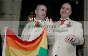 Christopher-Flanaghan-Henry-Kane-after-their-gay-wedding-ceremony-under-the-UKs-new-civil-partnership-laws,-Belfast-City-Hall,-Belfast,-Northern-Ireland