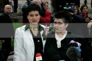 Shannon-Sickels-Grainne-Close-face-the-media-before-their-gay-wedding-under-the-UKs-new-civil-partnership-laws,-Belfast-City-Hall,-Belfast,-Northern-Ireland