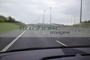driving-along-empty-M6-toll-road-motorway-england-uk