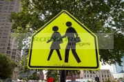 luminous-yellow-pedestrian-crossing-warning-sign-on-crosswalk-in-downtown-chicago-illinois-united-states-america
